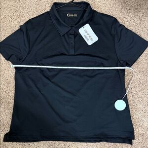 Ziva Women's Black Polo Shirt fits more like a medium